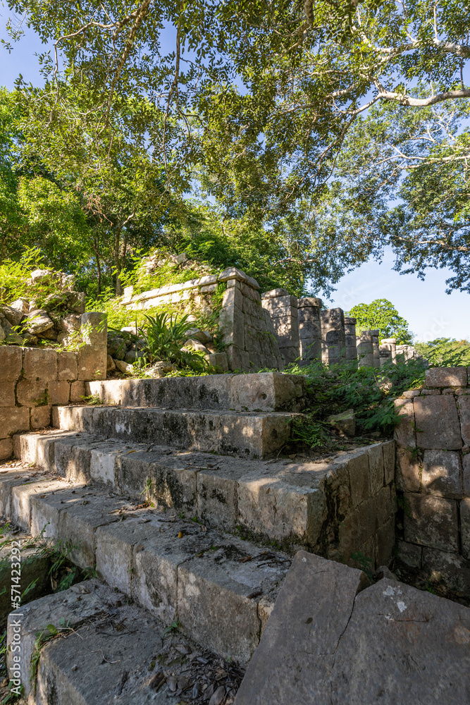 The ruins of a beautiful pyramid in the archaeological zone of Chichen Itza in Mexico