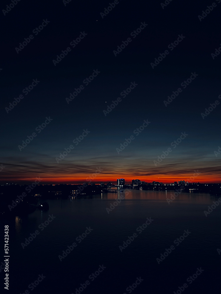 night view of the city with Jupiter and Uranus night view of the city with Jupiter and Uranus