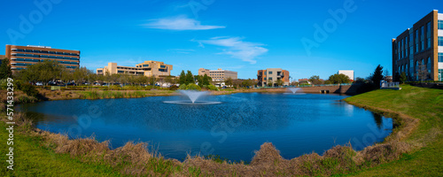 Pensacola City Skyline over the Community Maritime Park with Water Fountains in Florida, USA, modern downtown with open space and walking trails