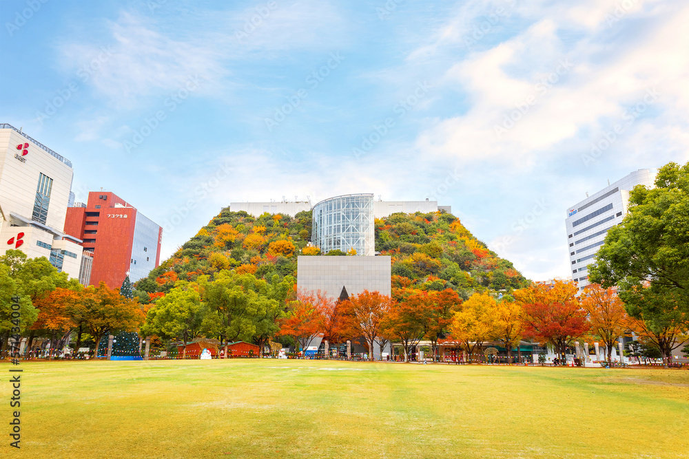 Fukuoka, Japan - Nov 21 2022: ACROS Fukuoka is a conventional office building with a huge terraced of a park. The garden reaches 60 meters above the ground