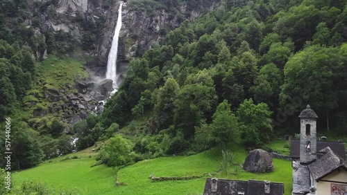 Rural village of Foroglio on Bavona valley with waterfall behind, Switzerland photo