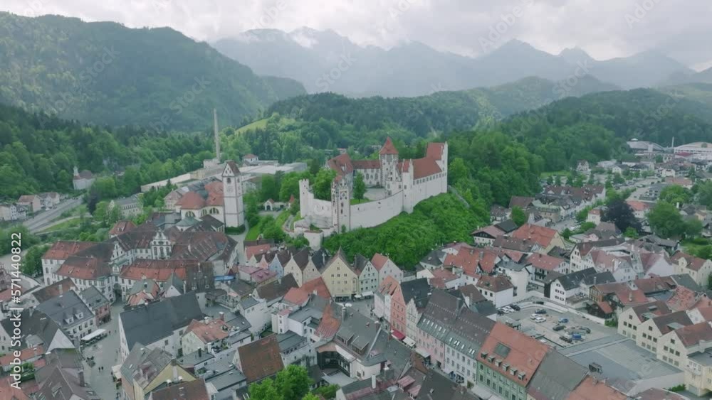 Füssen seen from above, clouds and mountain range in the background. Füssen seen from above, clouds and mountain range in the background.