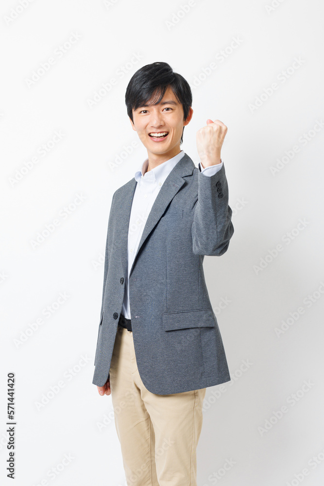 ガッツポーズをする会社員 ガッツポーズをする会社員