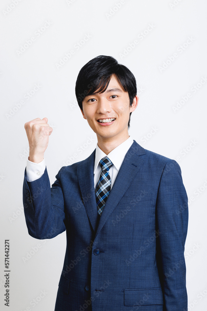 ガッツポーズをするビジネスマン ガッツポーズをするビジネスマン