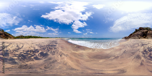 Sandy beach and blue ocean waves. Elephant Rock  Arugam Bay  Sri Lanka. 360 panorama VR.