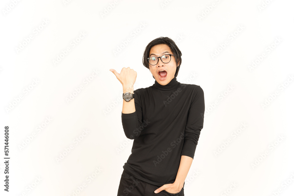 Presenting and Pointing Side Product Using Thumb Of Handsome Asian Man Isolated On White Background Presenting and Pointing Side Product Using Thumb Of Handsome Asian Man Isolated On White Background