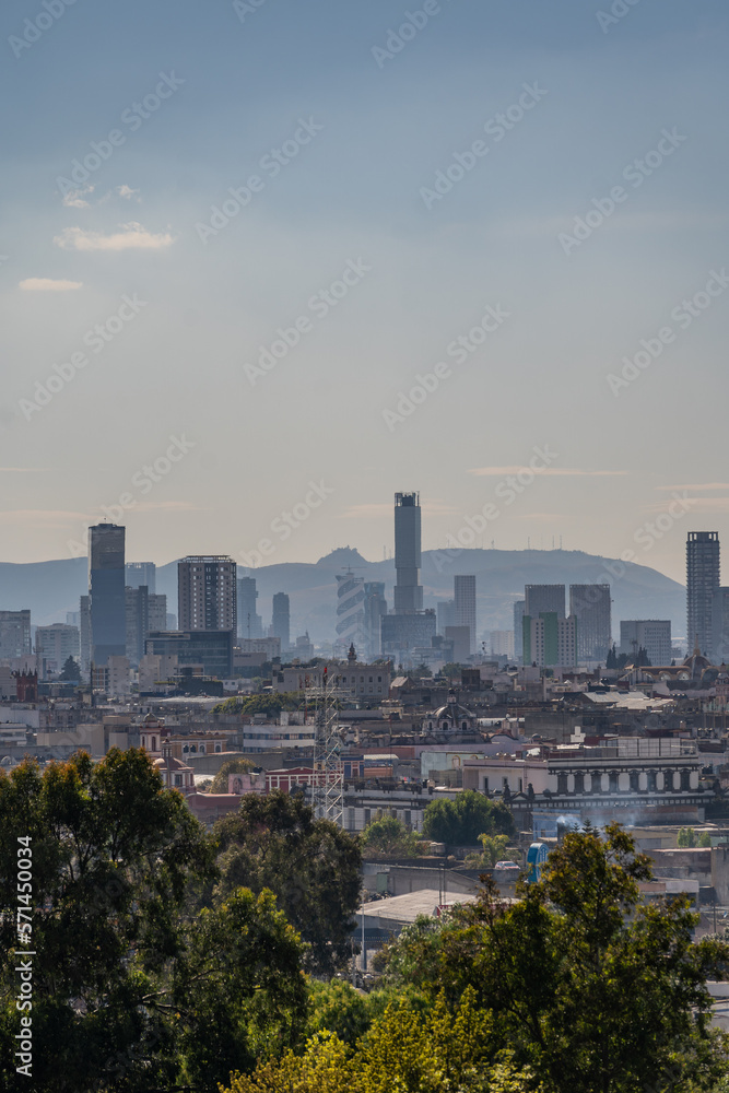 Fototapeta premium Beautiful view of the large Mexican city of Puebla. View of the endless mountain peaks around the city.