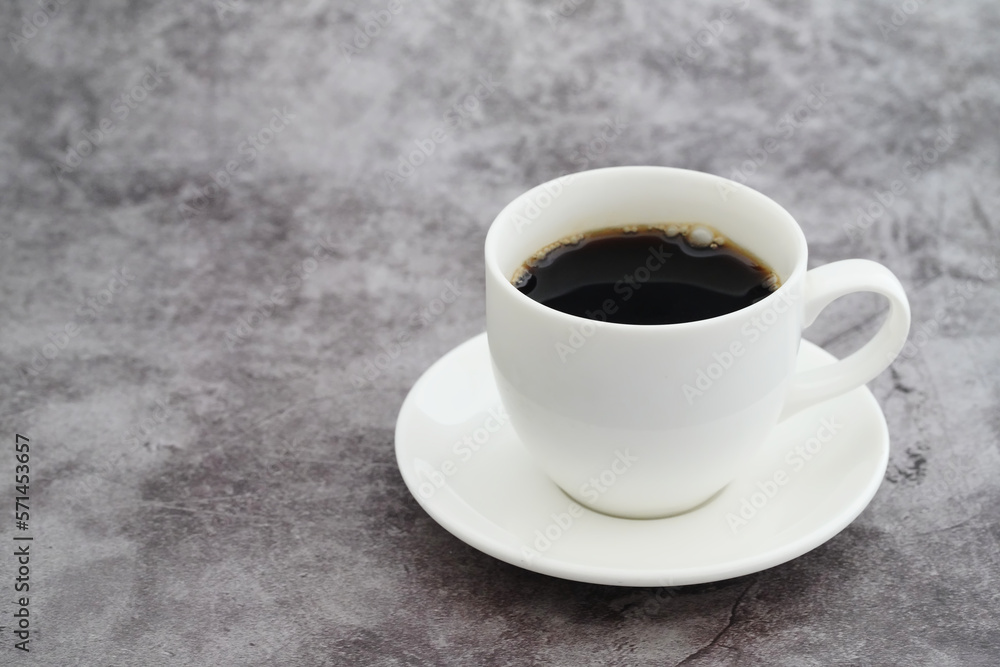 white cup of coffee on retro background white cup of coffee on retro background