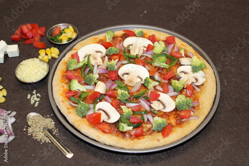 pizza with vegetables - broccoli and mushroom