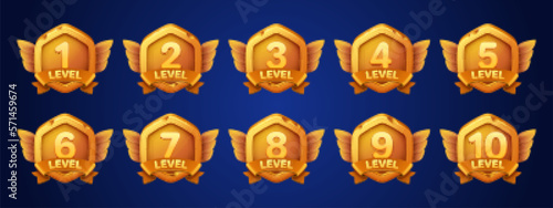 Game damaged gold badges with level number. Achievement rank emblems, golden broken hexagon label of game level with ribbon and wings, vector cartoon set isolated on background