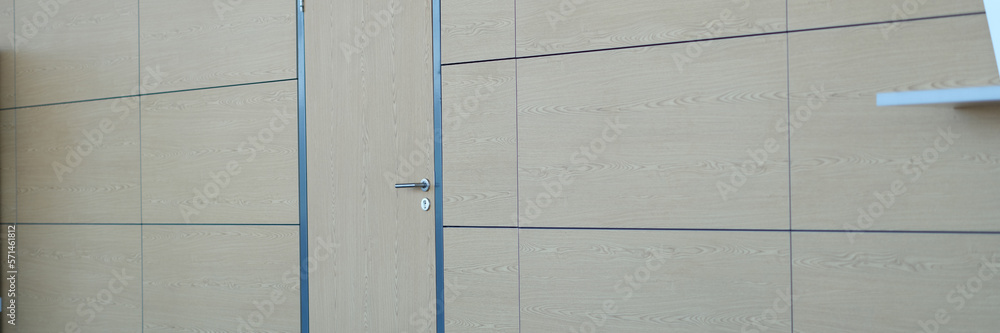 Light brown door and wall in building of airport station or business center Light brown door and wall in building of airport station or business center