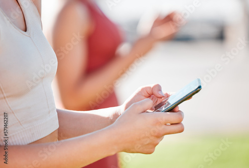 woman hands, phone and outdoor with 5g network connection for communication or fitness app. Person outdoor with smartphone for social media, contact and typing for online search or chat at park