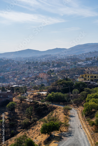 Very beautiful view of the city at sunset in the Mexican city of Guanajuato surrounded by large mountains.