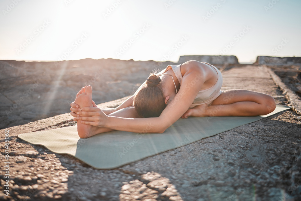 Yoga, wellness and woman stretching body on rock for healthy lifestyle, pilates training and cardio workout. Sports, fitness and girl doing meditation, stretch and exercise for zen, peace and calm - obrazy, fototapety, plakaty 