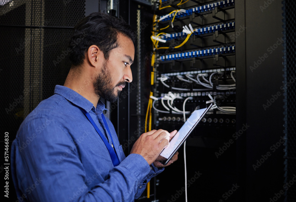 Database tablet, server room and engineer man looking at research for maintenance or software update at night. Cybersecurity, it programmer or male coder with technology for networking in data center - obrazy, fototapety, plakaty 