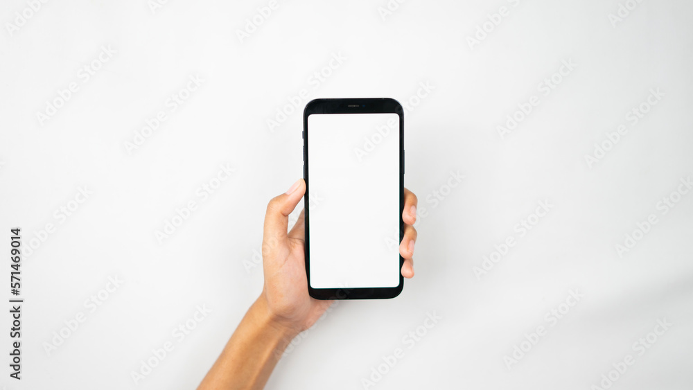 Hands holding blank screen smartphone for interface display Hands holding blank screen smartphone for interface display