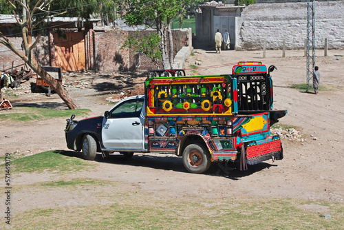 A small bus in Swat valley of Himalayas, Pakistan photo