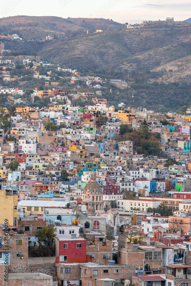 Very beautiful view of the city at sunset in the Mexican city of Guanajuato surrounded by large mountains.