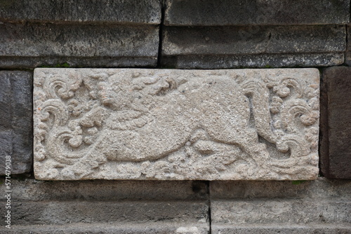 Carved stone of penataran temple (panataran temple), Blitar, East Java Indonesia photo