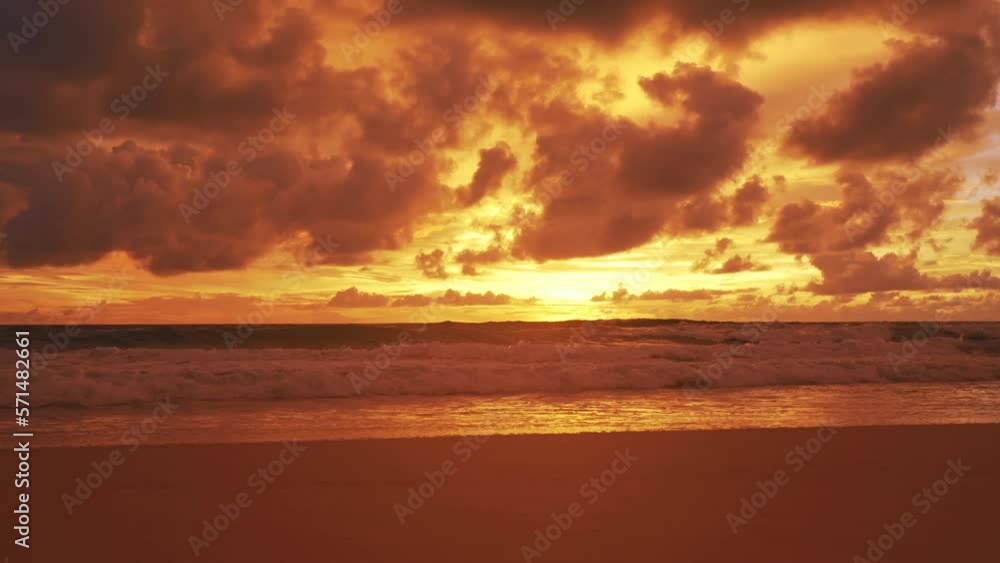 Red purple orange blue pink sunsets over sea and Burning sky and shining golden waves.Sun over sea silhouette paradise island. Red purple orange blue pink sunsets over sea and Burning sky and shining golden waves.Sun over sea silhouette paradise island.