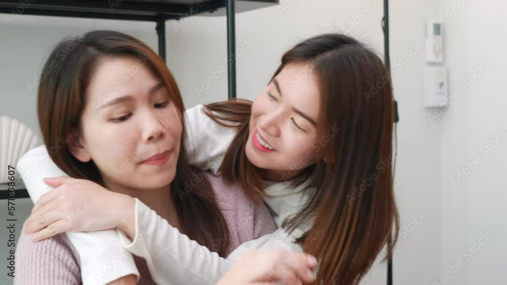 Asian middle age woman and teen they shoping online on computer, mother and teenage daughter looking at laptop computer at home office, happy family work together Asian middle age woman and teen they shoping online on computer, mother and teenage daughter looking at laptop computer at home office, happy family work together