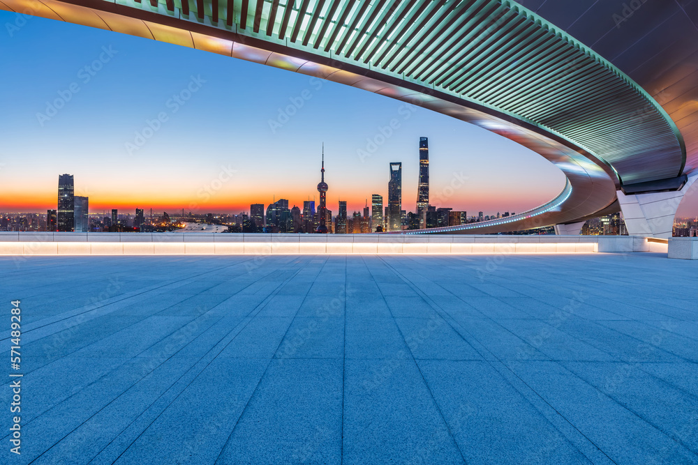 Empty square floor and bridge with city skyline at sunrise in Shanghai, China. - obrazy, fototapety, plakaty 
