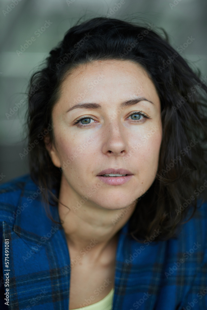 Portrait of a business woman smiling and happy. Dark blue jacket, confident woman looking in the camera High quality photo Portrait of a business woman smiling and happy. Dark blue jacket, confident woman looking in the camera High quality photo