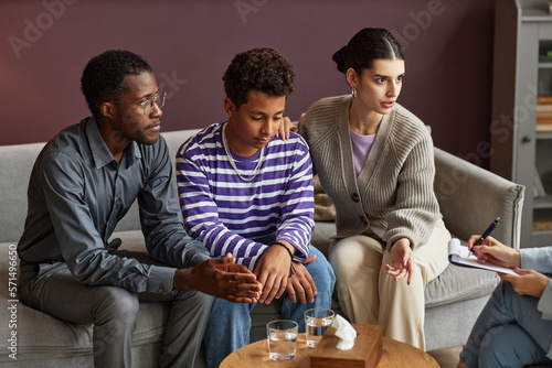 Family Discussing Problems with Psychologist
