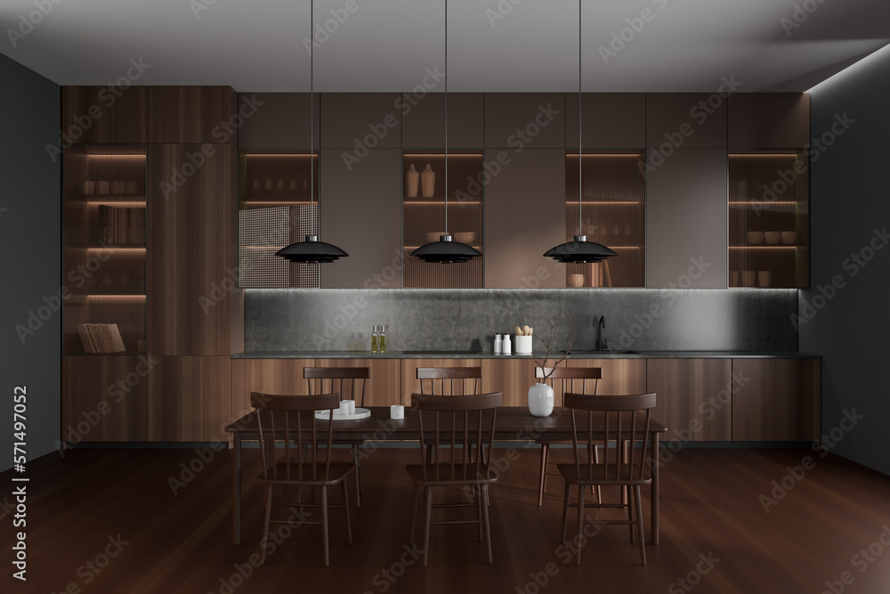 Front view on dark kitchen room interior with dining table Front view on dark kitchen room interior with dining table