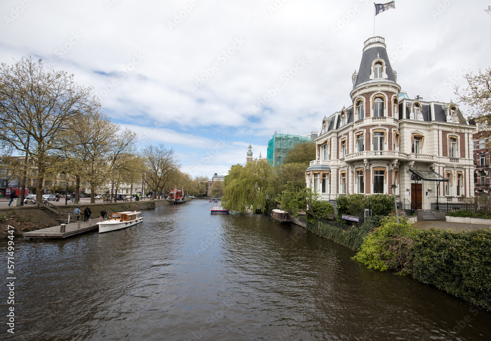  Traditional historic Dutch gable houses beside canal in Amsterdam The Netherlands
