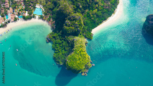 Railay, also known as Rai Leh, is a small peninsula between the city of Krabi and Ao Nang in Thailand. It is accessible only by boat due to high limestone cliffs cutting off mainland access.	 photo