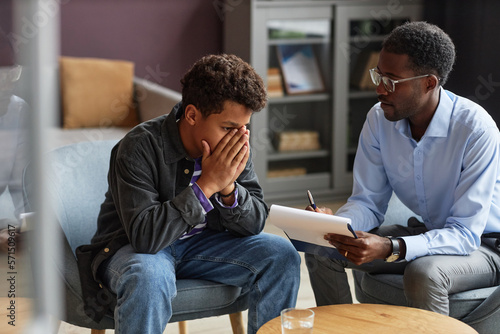Photo Boy Sharing Problems with Psychologist