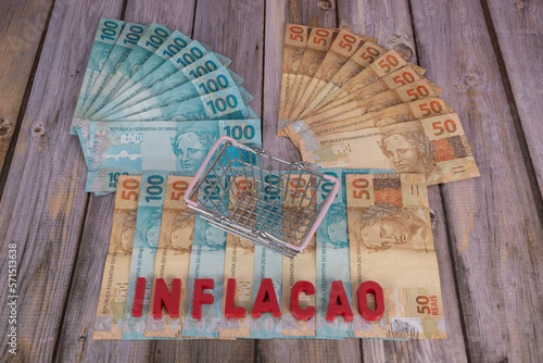Brazilian banknotes. Banknotes of 50 and 100 reais at the bottom with the word 