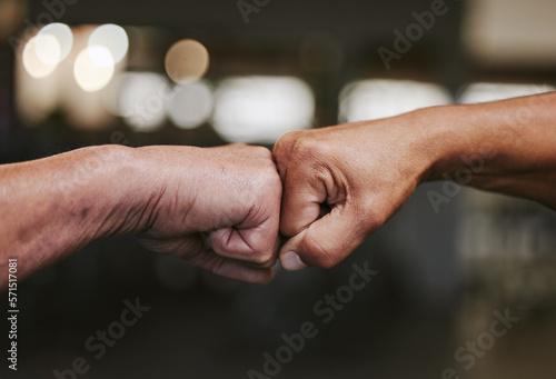 Bild auf Leinwand Hands, fist bump and fitness motivation for sports, greeting or team building in gym for wellness