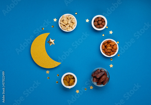  Traditional Muslim Iftar Food. Ramadan Kareem concept on Blue Background.