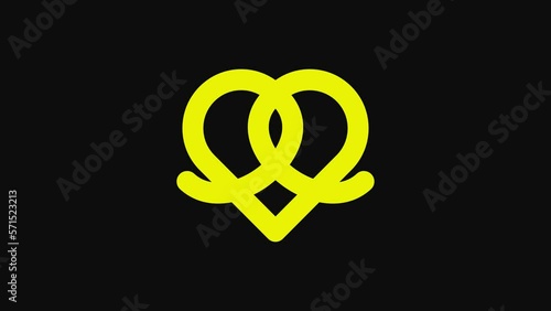 Yellow Pretzel icon isolated on black background. German comfort food pastry. Oktoberfest festival. 4K Video motion graphic animation