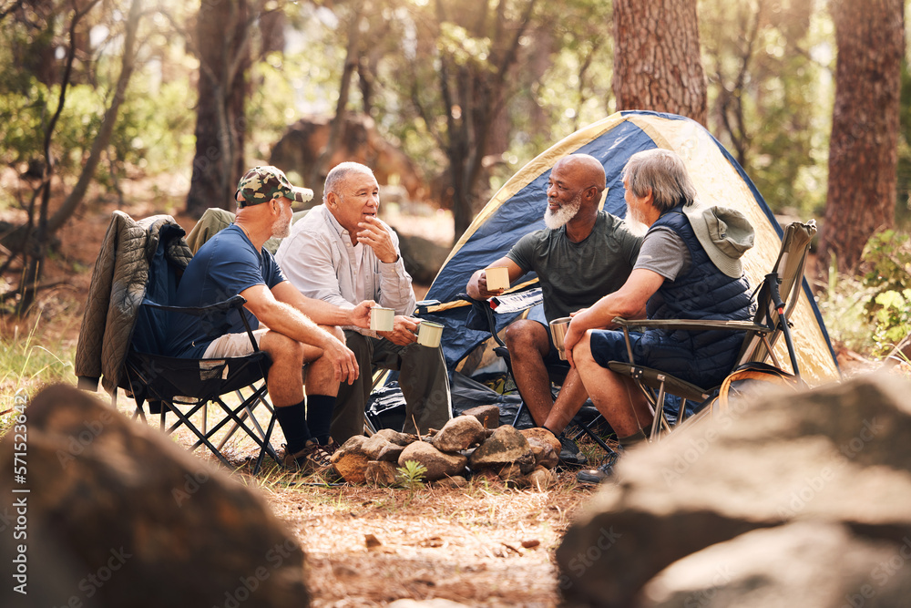 Foto Stock Senior people, camping and relaxing in nature for travel,  adventure or summer vacation together on chairs by tent in forest. Group of  elderly men talking, enjoying camp out conversation in