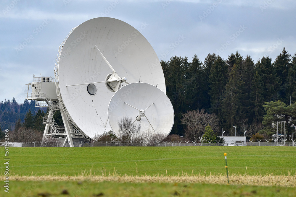 parabolic radio and television antennas for receiving satellite signals.