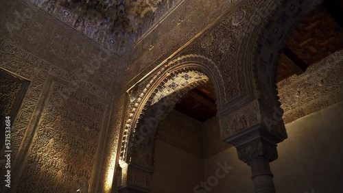 Interior of the Alhambra in Granada, arch with Islamic motifs in a Muslim historical style