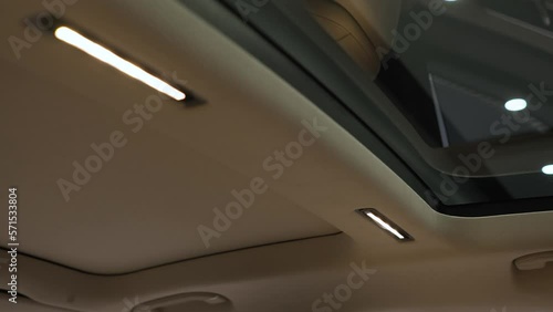 Interior view of car sunroof opening, interior. photo