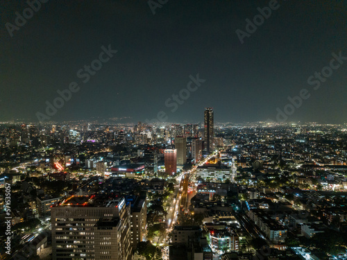 Fototapeta Naklejka Na Ścianę i Meble -  Beautiful aerial view of the capital of Mexico city at night.