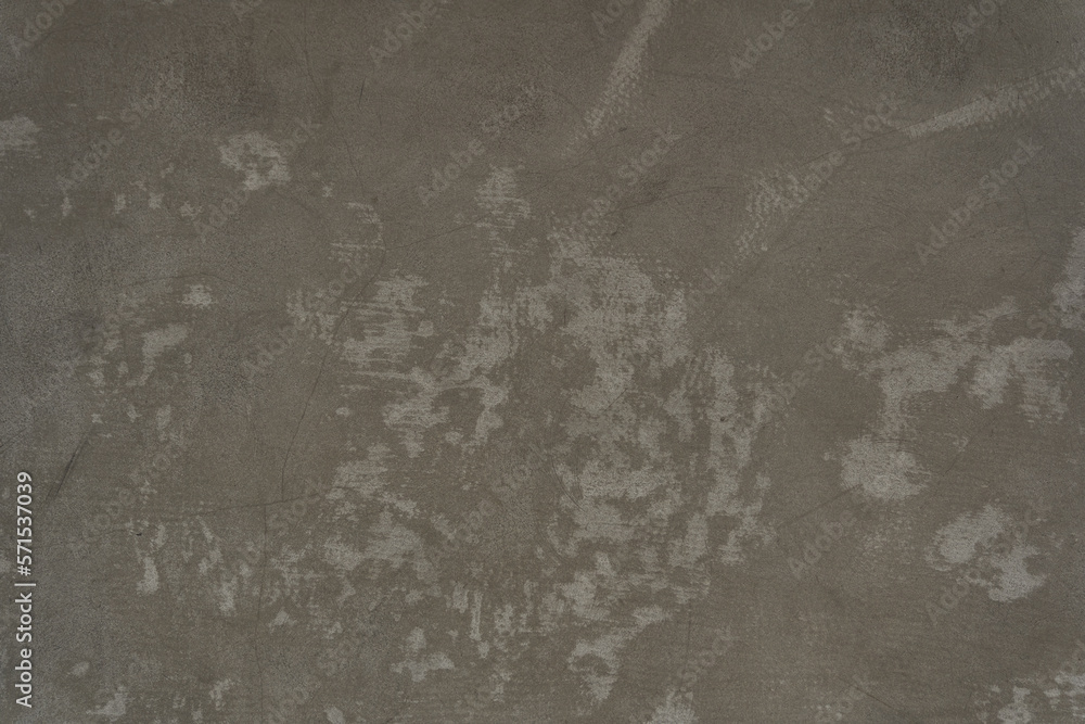 Naklejka premium Brown concrete texture. Stone wall background. Surface of the concrete old floor in scratches. High quality photo