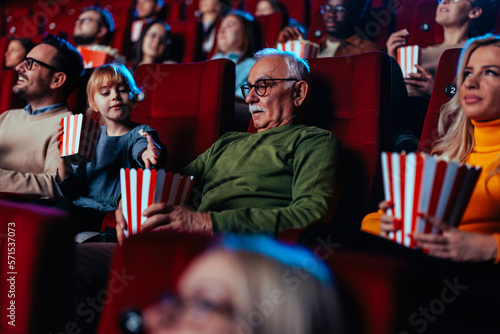 Grandfather and grandchild bonding in cinema.