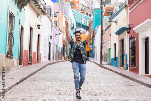Mexican man traveling in Guanajuato. Student exploring a colorful city.  © Luna Vandoorne