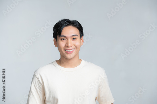Attractive young handsome smiling face positive asian