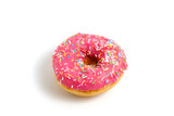 Donut with pink icing and multicolored sugar sprinkles.On white background.