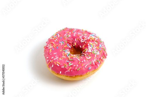 Donut with pink icing and multicolored sugar sprinkles.On white background.
