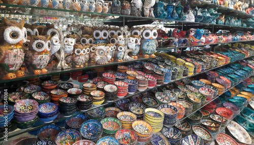 Multicolored painted ceramic oriental plates in the market at Medina. Marakesh. Morocco. Oriental interior design © syhin_stas