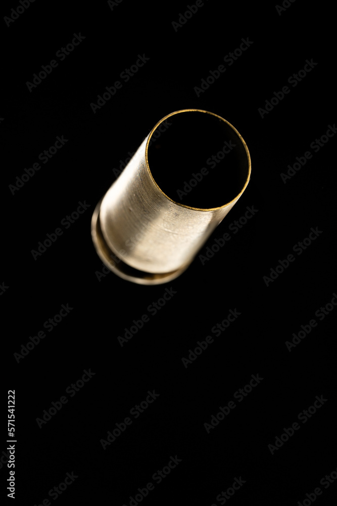 Pistol bullet casings isolated on black background Pistol bullet casings isolated on black background