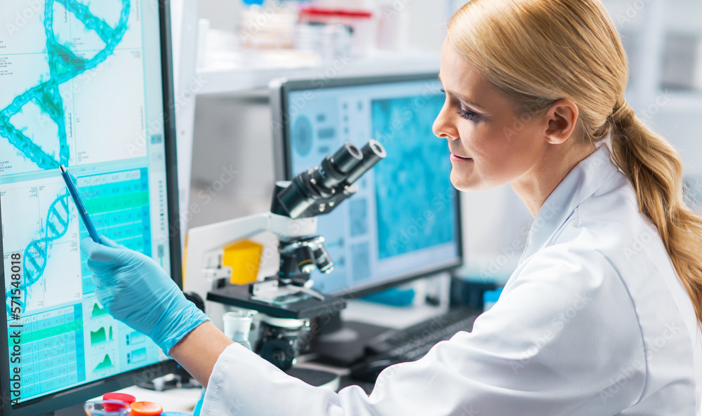 Professional female scientist is working on a vaccine in a modern scientific research laboratory. Laboratory tools: microscope, test tubes, equipment. Future technology, healthcare and science. Professional female scientist is working on a vaccine in a modern scientific research laboratory. Laboratory tools: microscope, test tubes, equipment. Future technology, healthcare and science.